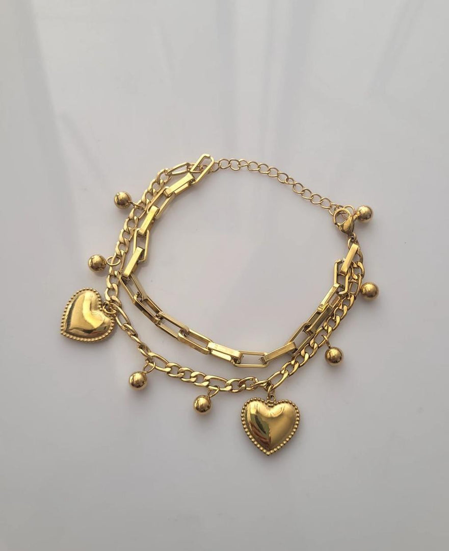 Dual heart charm