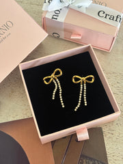Bow dangles