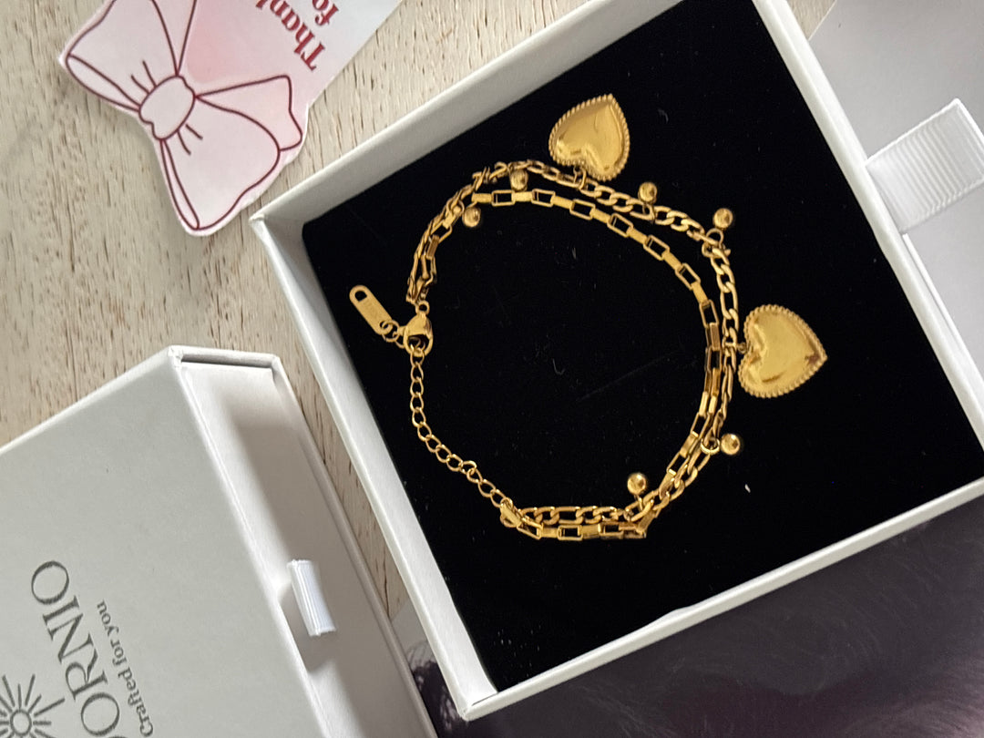 Dual heart charm