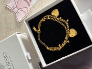 Dual heart charm