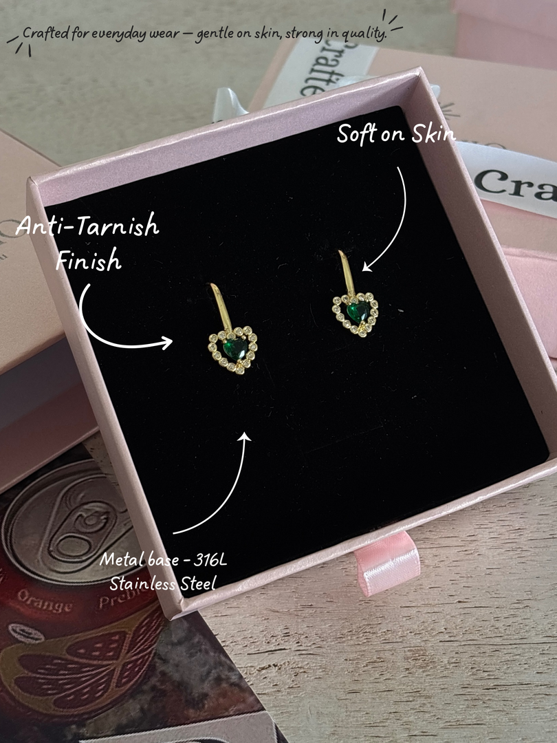 Heart emerald studs